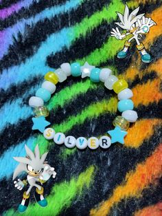 if anyone wants to suggest a character I should make into a bracelet or any jewelry of your choice, feel free to comment! #silverthehedgehog #silver #sonic #sonicthehedgehog #kandi #bracelet Sonic Diy Crafts, Character Bracelet Ideas, Sonic Bracelet Pattern, Kandi Accessories, Sonic Bracelet, Sonic Kandi, Crafts To Do When Your Bored