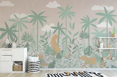 a room with palm trees and animals painted on the wall in pastel green tones