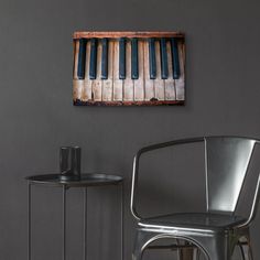 a metal chair sitting next to a small table