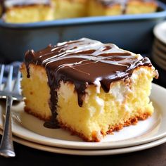 a piece of cake with chocolate icing on a plate