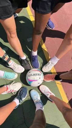 a group of people standing in a circle with their feet on a ball that reads sterild