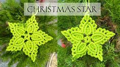 two green ornaments hanging from a tree with the words christmas star written in front of them