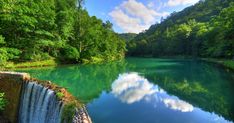 there is a beautiful view of the water and trees in the area that looks like it's from another world