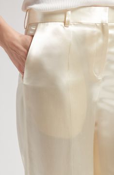 A smooth silk lining lends gliding ease to satin pants designed in a straight-leg silhouette with clean creases and plenty of pockets. 32" inseam; 24" leg opening; 12 1/2" front rise; 17" back rise (size 14) Zip fly with hook-and-bar closure Front slant pockets; back welt pocket 100% viscose Dry clean Made in Italy Designer Clothing Bead Sewing, Fairy Academia, Silk Dress Pants, Womens Straight Leg Pants, Milk Color, Satin Pants, Closet Essentials, Silk Pants, Fabric Gift Bags