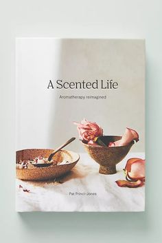 a book with an image of two bowls and spoons on top of each other