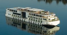 a large boat floating on top of a body of water