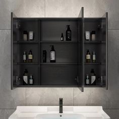 a bathroom sink sitting under a mirror next to a shelf filled with personal care items