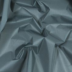 an up close shot of a blue fabric