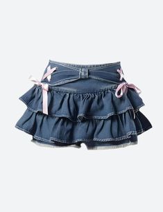 These jeans offer a fresh take on the denim trend with a playful, low-rise waist and flared silhouette. The layered mini design injects a youthful exuberance, while the skort functionality ensures practicality. It's a stylish ode to fun and freedom—ideal for those who dance to their own beat. Denim material Ruffled design Ribbon lace up details at side Denim belt detail at front Distressed detail at shorts Low rise Cotton, polyester