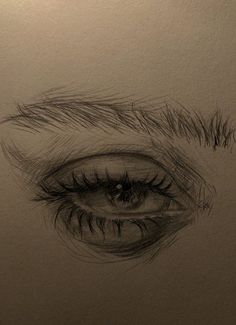 a drawing of an eye with long eyelashes