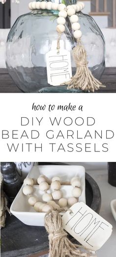 a glass vase filled with white flowers on top of a wooden table next to a sign that says how to make a diy wood bead garland with tassels