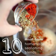 someone pouring spices into a glass bowl