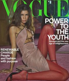 a magazine cover with a woman laying on the floor