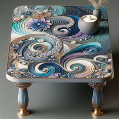 Feast your eyes on this exquisite resin art table; its intricate swirls of soft blues, lavender and gleaming gold evoke a floral splendor. Ideal for living rooms or art studios, its shimmer adds a dash of glamor. #ResinArt #ArtTable #HomeDecor #ArtStudioFurniture #InteriorDesign #FloralResinDesign Resin Art Table, Ornamental Art, Resin Table Top, Gold Jewellry, Boutique Ideas, Abstract Flower Art, Resin Design, Diy Resin Art, Diy Resin