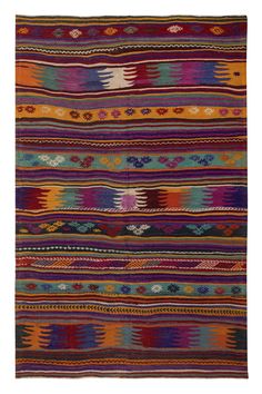 a multicolored striped rug with different colors and patterns on the bottom, in various sizes