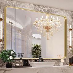 a bathroom with a sink, mirror and potted plants