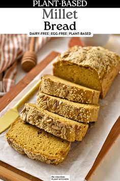 sliced loaf of bread sitting on top of a cutting board