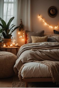 Cozy bedroom with soft lighting, a neatly made bed with pillows and throws, candles, and string lights creating a warm ambiance. Cozy Earth Bedding, Calm Earth Tone Boho Minimalist Bedroom, Peaceful Earthy Bedroom, Earthy Cozy Bedroom, Modern Earthy Bedroom Blankets, Bedroom Aesthetic Cozy Sunset, Rustic Wooden Headboard