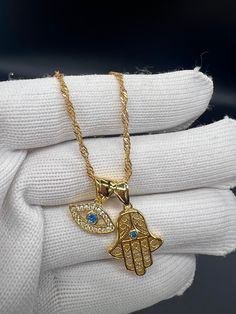 "22K CARAT GOLD FILLED WAVE CHAIN, NECKLACE WITH TURQUOISE LUCKY HAMSA AND EVIL EYE CHAIN LENGTH 45cm/18\" CHAIN WIDTH 2mm This Pendant has a thick layer of gold plating, that does not discolour or oxidize. It is hypoallergenic, which means that it does not react with human skin. IT IS ABSOLUTELY STUNNING! THE NECKLACE WILL BE PRESENTED IN A GIFT BOX Is This Piece Made Of Solid Gold? No.  The item is Gold Filled , used to describe a specific form of gold plating, does not, as the term implies, m Gold Bangles Indian, Hamsa Jewelry, Gold Bond, Adjustable Bangle, Evil Eye Pendant, Solid Gold Jewelry, Evil Eye Necklace, Hamsa Hand, Cuff Bangles