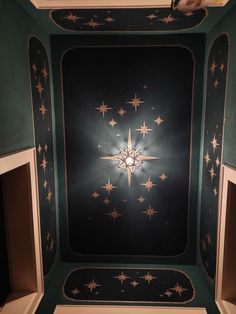 a ceiling with stars painted on it