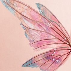 a pink and blue butterfly with stars on its wings