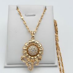 GOLD PLATED JEWELRY PENDANT 18K Gold Plated Size: 1.75" H (Including bail) *Size Reference: A Quarter Coin is 0.95in / almost 1 inch* CHAIN 18K Gold Plated Length: 18 inches Great gift for Mother's Day, anniversary, birthday, or any occasion.  Condition:100% new and high quality It's a perfect accessory, also a good gift to your friends It will make you beautiful on picture. Suitable for any season. Special design and unique structure, a popular item Great accessory and decoration for your daily Gold Flower Pendant Jewelry With Cubic Zirconia, Gold Cubic Zirconia Flower Pendant Jewelry, Makes You Beautiful, Necklace Women, Jewelry Pendant, Fashion Jewelry Necklaces, Special Design, Gold Plated Jewelry, Jewelry Plate