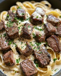 pasta with meat and sauce in a bowl