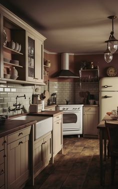 Vintage Kitchen Design The heart of home decor kitchen vintage is in the design itself. Vintage kitchen design involves the use of classic elements such as subway tiles, wooden cabinetry, and open shelving. These design elements help achieve the timeless look that many vintage enthusiasts crave. 1950 Kitchen Remodel, 1930 Kitchen, Vintage Kitchen Design, 1940s Kitchen