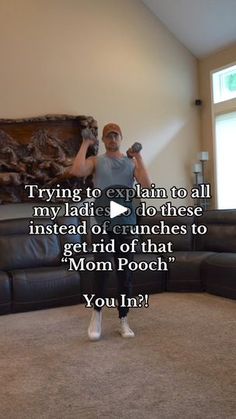 a man is standing in front of a couch with his arms up and the caption says trying to explain to all my ladies