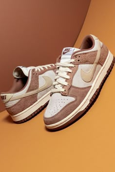 The next generation of Nike Dunks are here. On the “Medium Curry” colorway, the former basketball shoe is treated to a new design that swaps the model’s original leather body for hairy suede panels in versatile, everyday hues. Shoe Plug, Sneakers Art, Preppy Shoes, All Nike Shoes, Sneaker Art, Stadium Goods, Urban Streetwear, Sb Dunk, Swag Shoes