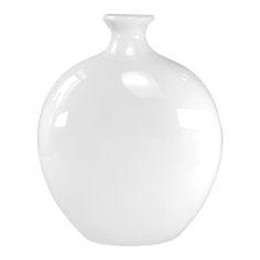 a large white vase sitting on top of a table