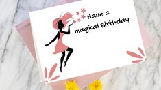 a birthday card with a silhouette of a woman holding a flower and the words have a magical birthday written on it