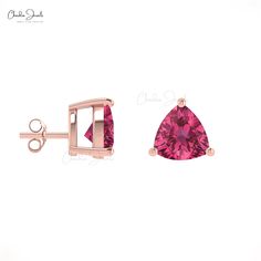 Description The right piece of earrings can transform any appearance by adding a finishing touch to any style or look. These solitaire studded earrings are a timeless and classic piece of jewelry that can be fashioned for any and every occasion. This earring typically features a trillion-cut natural pink tourmaline gemstone in a 3-prong setting, which allows the stone to shine beautifully. This charming earring is designed in 14k solid gold, which makes it a perfect piece to be dressed up for a Trillion Earrings, Studded Earrings, Diamond Jewel, Solitaire Studs, Gemstone Stud Earrings, Tourmaline Stone, Gemstone Studs, Tourmaline Gemstone