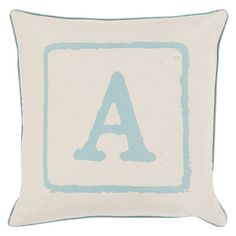 a pillow with the letter a in blue and white on it's front side