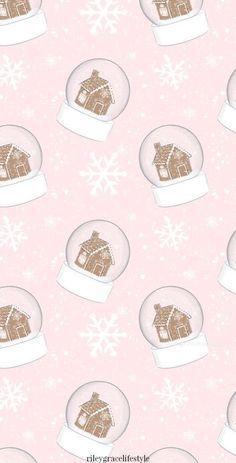 snow globes with houses in them on a pink background that is filled with snowflakes