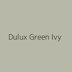 the words dulux green ly are in black and white on a gray background