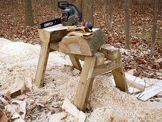 a bench made out of wood with a chainsaw on it