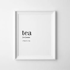 a black and white poster with the word tea in it's center on a wall