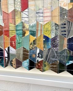 a close up of a window with many different colored squares