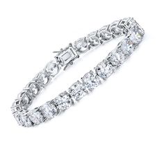 PRICES MAY VARY. Classic Tennis Bracelet- featuring round 6mm AAA+ cubic zirconia stones in four-prong basket settings. Sterling Silver and CZ — 13.50 ct. t.w. CZ tennis bracelet in high quality 925 sterling silver, white gold Polished. Round brilliant-cut Cubic Zirconias, Lead-free, Eco-friend and hypoallergenic setting. Size - 8.5 inches length, 6mm diamond Perfect Jewelry Gift - Jewelry gift box packing.Iedal gift for Mom, sister, girlfriend or yourself. Great sparkly jewelry gifts for Christ Expensive Bracelets, Sparkly Jewelry, Small Bracelets, Gold Bracelet For Women, White Gold Bracelet, Tennis Necklace, Gold Polish, Tennis Bracelet, Jewelry Gift Box