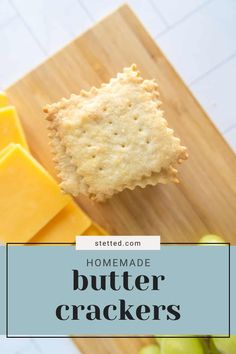 homemade butter crackers on a cutting board with grapes and cheese in the background text reads homemade butter crackers