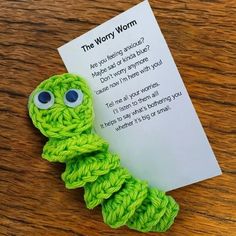 the very wormy worm craft is made with yarn