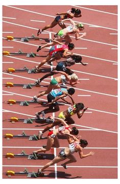 several athletes are competing in a track race