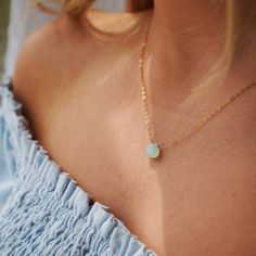 The Aqua Chalcedony gem is the star of our Tahoe Necklace! Catching the sunshine just right, this necklace adds a touch of color to your stack. DETAILSAvailable in 14k Gold Fill and Sterling SilverNecklace sizes: 14", 16" 18" with 1" extension Gemstone measures 0.25"Hypoallergenic and waterproof Gold Jewelry Gift, Forever Jewelry, Aqua Chalcedony, Solid Gold Jewelry, Pendant Bracelet, Necklace Sizes, The Sunshine, Wedding Men, The Star