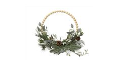 a wooden beaded wreath with pine cones and greenery