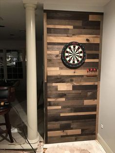 a dart board mounted to the side of a wooden door