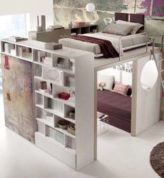 a loft bed is built into the side of a room with a desk, chair and bookshelf