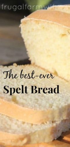 slices of bread sitting on top of a cutting board with the words, the best ever spelt bread