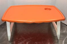 1970’s Orange Plastic Blisscraft of Hollywood TV Dinner Bed Lap Tray with beverage slot. This item is preowned with minor scuffs and marks from use. The colors is vibrant and it functions as designed. No chips or cracks. It’s in good vintage condition. Please see pictures to complete description. Thank you for shopping Missy’s Sourcing. GBShelf(item3) Lap Tray, Hollywood Vintage, Tv Dinner, Desk Tray, Lap Desk, Vintage Orange, See Pictures, Tray, Chips