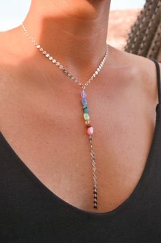 "This 7 Chakra Crystal Lariat necklace is absolutely stunning. It shimmers in the light when you move, sparkling with every turn. This is for the girl who loves chakras, crystals & aligning her energy!  The 7 Chakras are the energy systems in your body. When aligned, magic flows. Wear your Rainbow Energy Necklace and stay intentional on aligning your energy with what feels true and good for you! ▲ 7 crystals representing the 7 Chakras - Amethyst, Apatite, Turquoise, Prehnite, Citrine, Goldstone & Pink Opal ▲ Choose Sterling Silver or silver-plated disc chain ▲ Length of the lariat tail is 3\" ▲ Handmade in Arizona ▲Necklace size guide Model is wearing 16\" in photos but we always suggest measuring your neck to be sure it fits prefectly.  Shop all Chakra Jewelry here: https://www.etsy.com/s Energy Necklace, Silver Lariat Necklace, Silver Crystal Necklace, The 7 Chakras, Lariat Necklace Silver, Chakra Necklace, Silver Necklace Statement, Chakra Jewelry, 7 Chakra